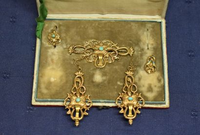 Parure or 585/°° composée d'une broche avec...