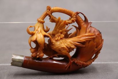 Une pipe en écume de mer à décor d'oiseaux....