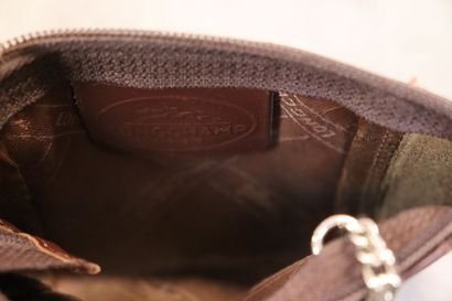 LONGCHAMPS. Réunion d'un sac, deux pochettes...