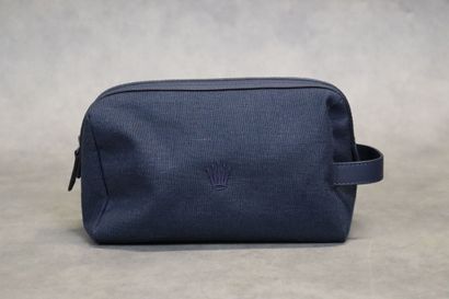 ROLEX. Trousse de toilette en toile et cuir...