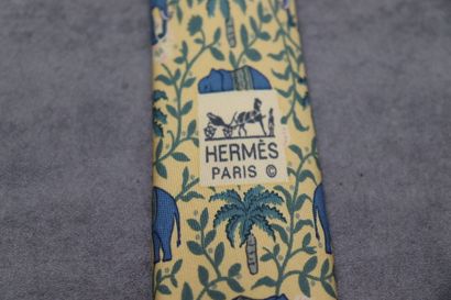 HERMES. Réunion de trois cravates en soie....