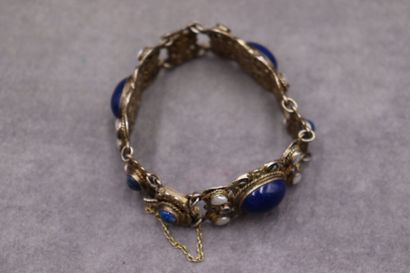 Un bracelet argent articulé avec 6 cabochons...