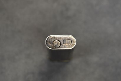 CARTIER. Briquet en acier avec monogramme...