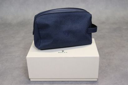ROLEX. Trousse de toilette en toile et cuir...