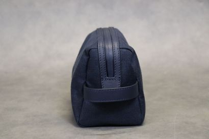 ROLEX. Trousse de toilette en toile et cuir...