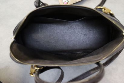 HERMES. Sac bolide en veau box marron et...