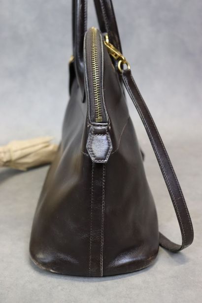 HERMES. Sac bolide en veau box marron et...