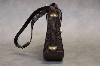 LANCEL. Sac bandoulière en lézard marron,...