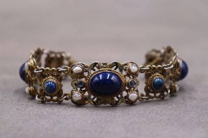 Un bracelet argent articulé avec 6 cabochons...