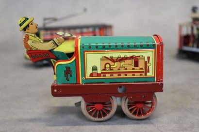 Réunion de trois jouets mécaniques en tôle...