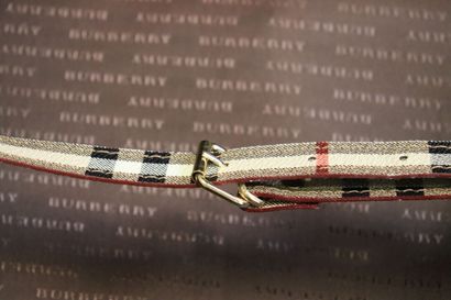 BURBERRY. Valise souple en toile enduite...
