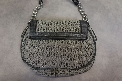 GUESS. Un petit sac à main en toile et cuir....