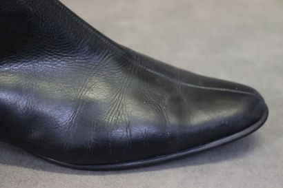 Christian DIOR. Paire de bottes en cuir noir,...