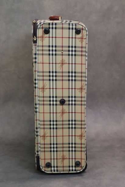 BURBERRY. Valise souple en toile enduite...