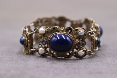 Un bracelet argent articulé avec 6 cabochons...