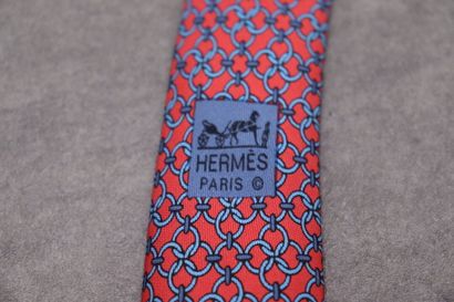 HERMES. Réunion de trois cravates en soie....