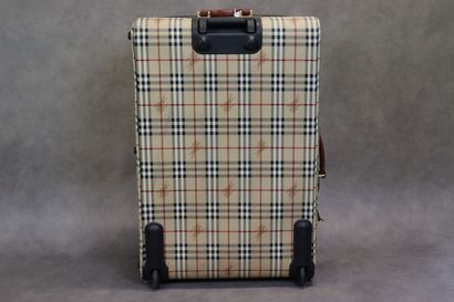 BURBERRY. Valise souple en toile enduite...