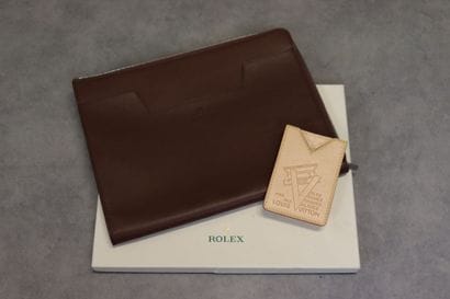 ROLEX. Etui pour ipad en cuir, une poche...