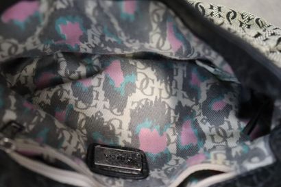 GUESS. Un petit sac à main en toile et cuir....