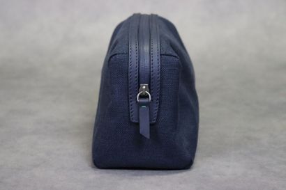 ROLEX. Trousse de toilette en toile et cuir...