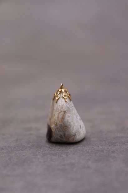 Réunion d'une paire de boutons de manchette...