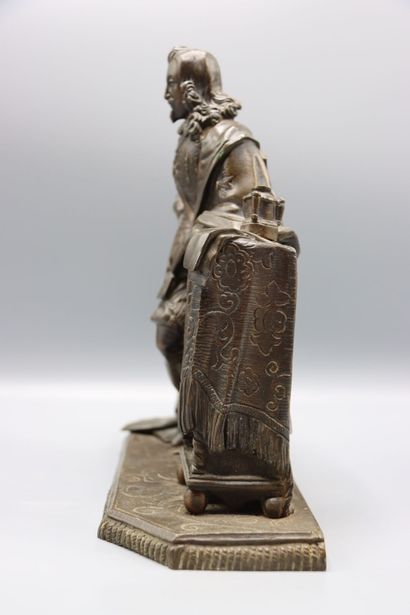 Sculpture in patinated bronze representing...