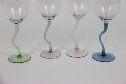 Four wine glasses with stylized feet. Dimensions:...