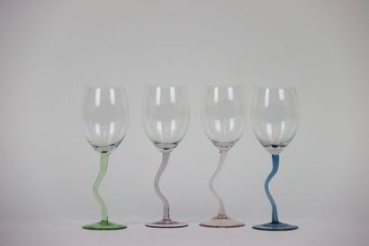 Four wine glasses with stylized feet. Dimensions:...
