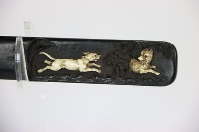 Coupe papier en bois aux motifs d'un chien...