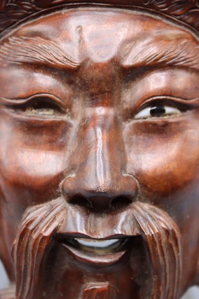 ASIA : Mask representing a crowned man with...