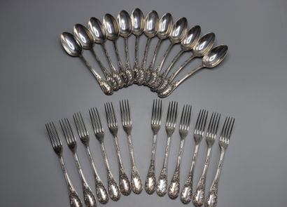 SILVER. Twelve forks and twelve spoons in...