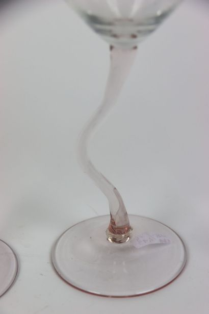 Four wine glasses with stylized feet. Dimensions:...