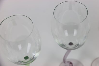 Four wine glasses with stylized feet. Dimensions:...