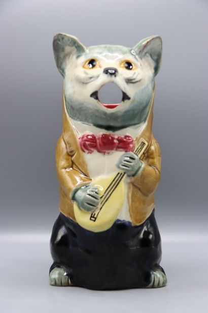 Pichet en barbotine polychrome de chez Orchies...