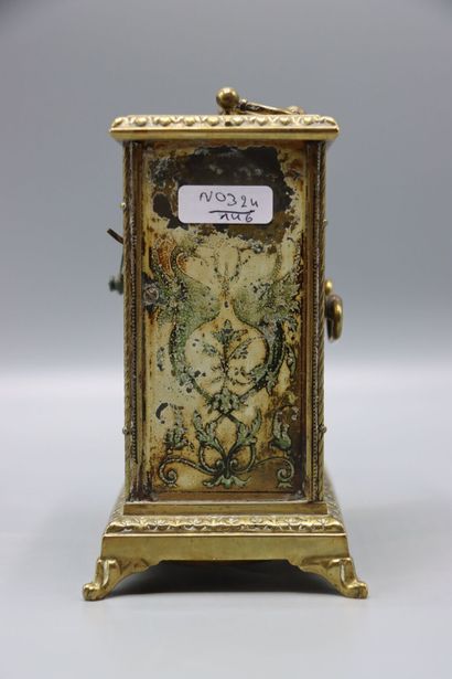 Petite pendule d'officier à décor polychrome...