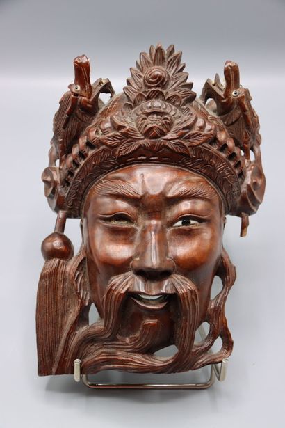 ASIA : Mask representing a crowned man with...