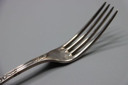 SILVER. Twelve forks and twelve spoons in...