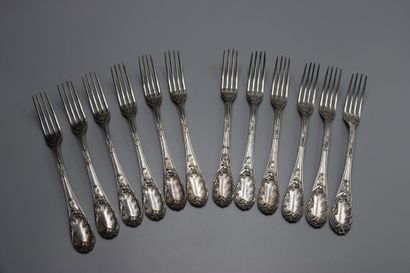 SILVER. Twelve forks and twelve spoons in...