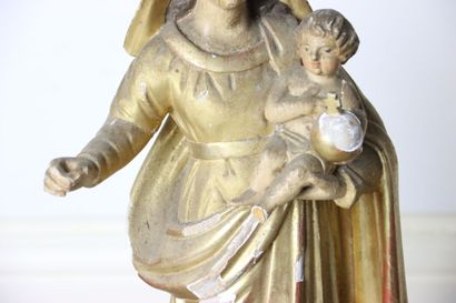 Vierge
en bois sculpté et doré. Hauteur :...