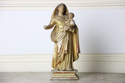 Vierge
en bois sculpté et doré. Hauteur :...