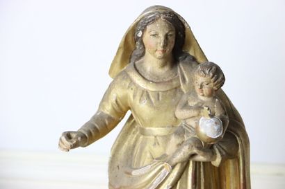 Vierge
en bois sculpté et doré. Hauteur :...