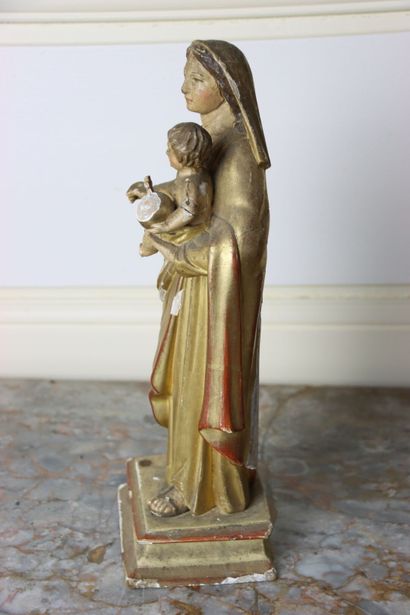 Vierge
en bois sculpté et doré. Hauteur :...