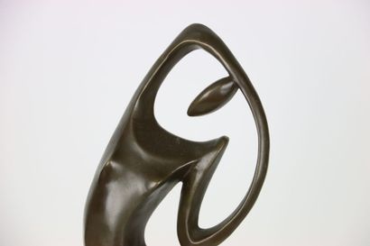 Large statue in bronze, representing a stylized...