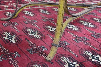 Wrought iron table decorated with yellow...