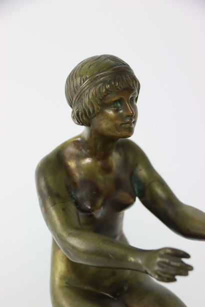 Gilded and chiseled bronze representing a...