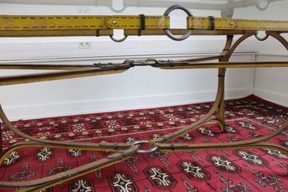 Wrought iron table decorated with yellow...