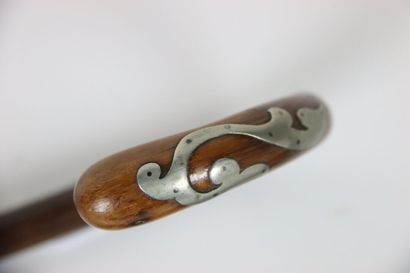 Set of 4 canes, some silver. Beginning of...