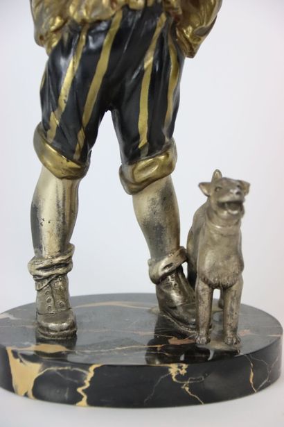 Sculpture in metal figuring gavroche and...