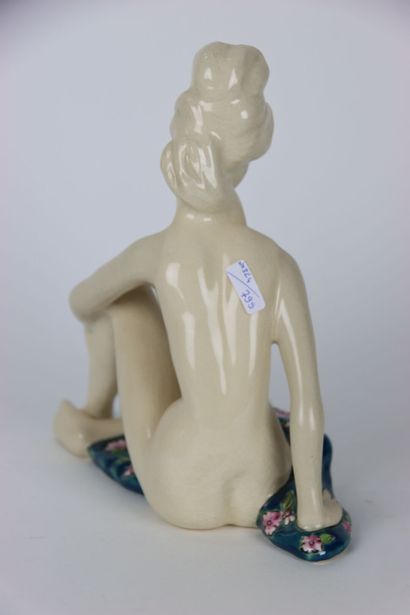 Large ceramic in crackle and polychrome enamels...