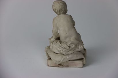 MOUGIN, Enfant assis sur un coussin à fleurs...